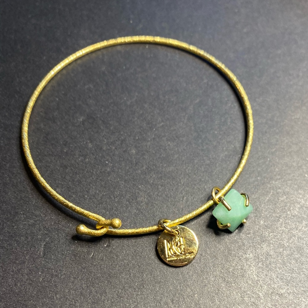 Moon and Lola bangle bracelet with aqua stone in gold tones.